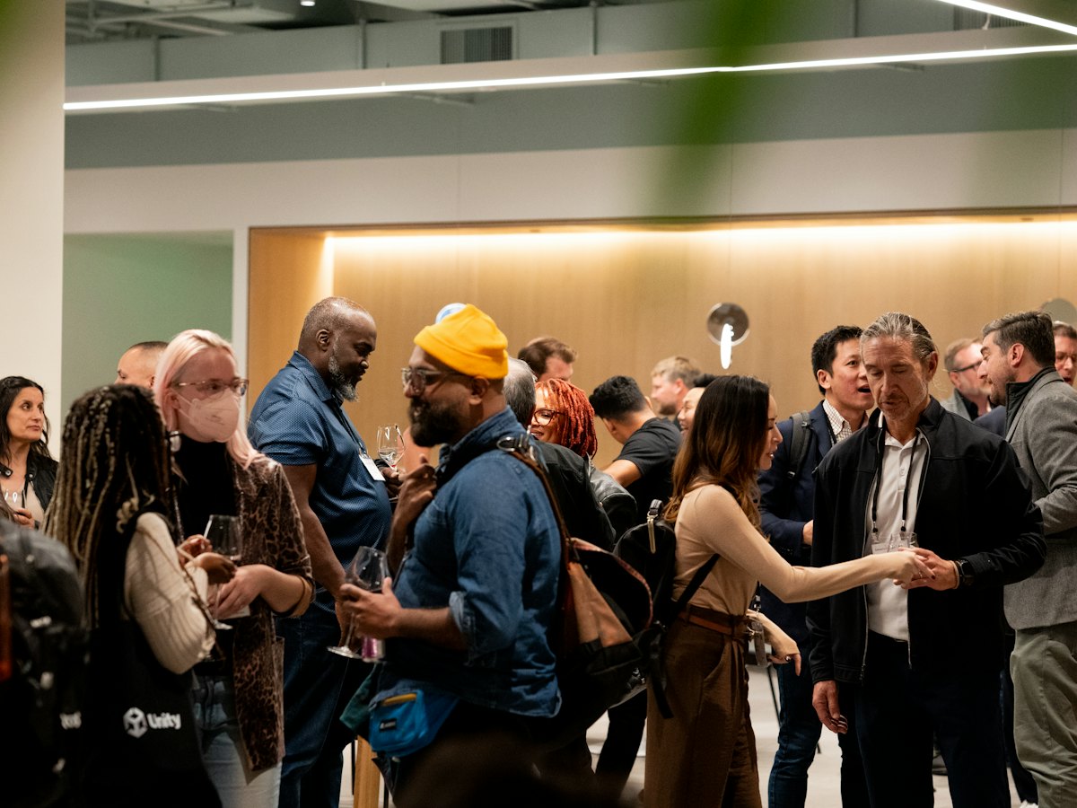 Guests talking at a hospitality and networking event